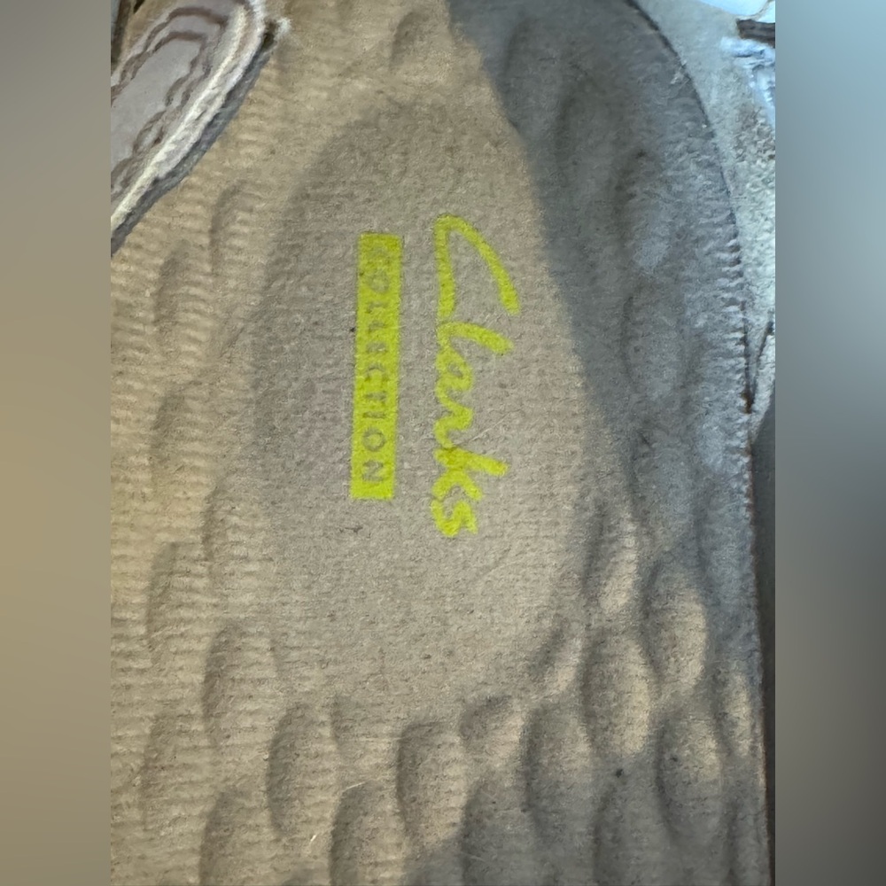 Clarks Footwear with Yellow Logo